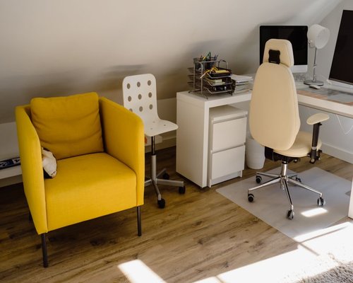 A clean and ergonomic home office setup with a comfortable chair